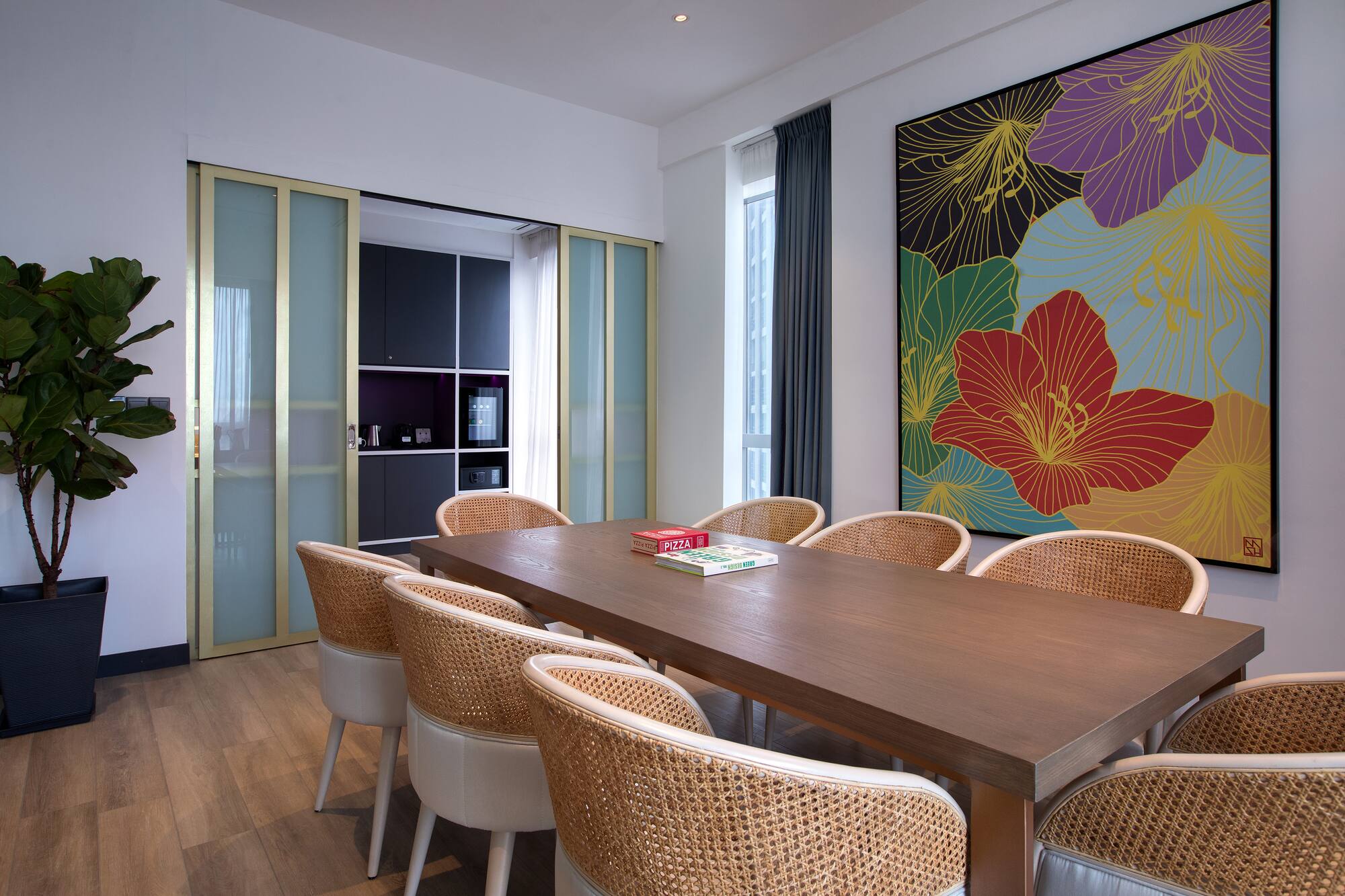 a room with a table and chairs