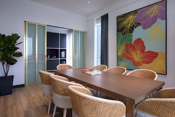 a room with a table and chairs