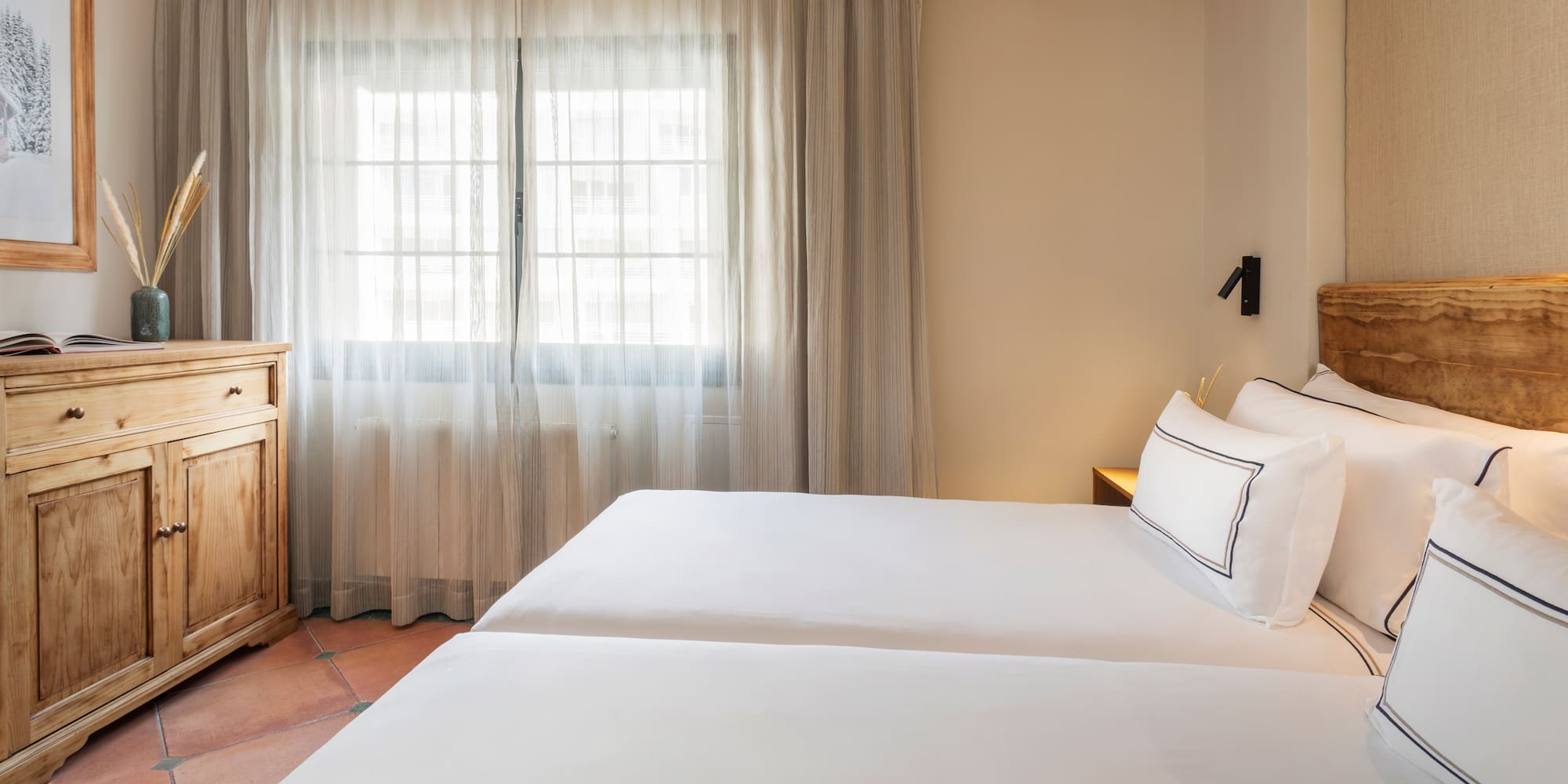 a two beds in a room