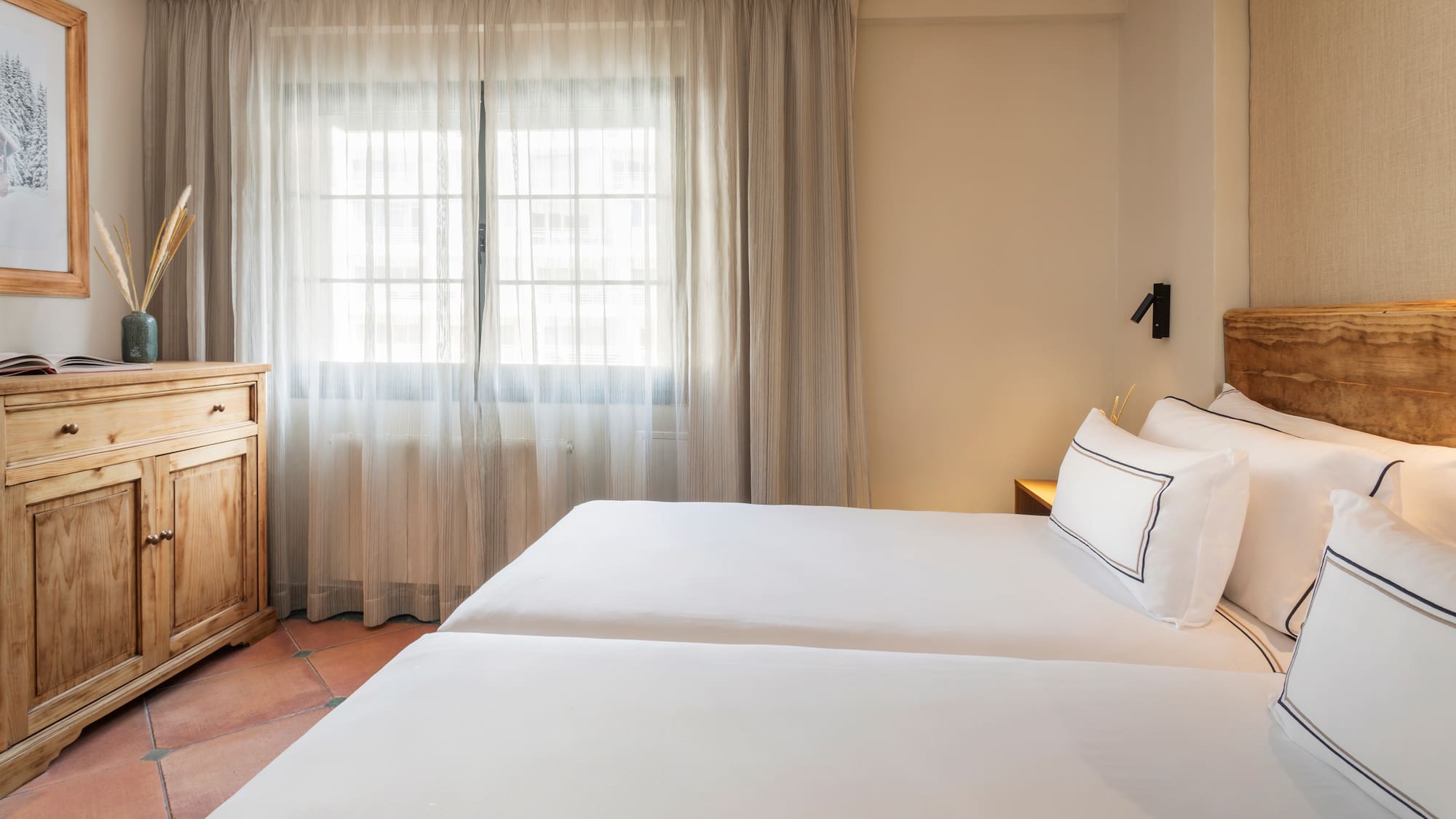 a two beds in a room