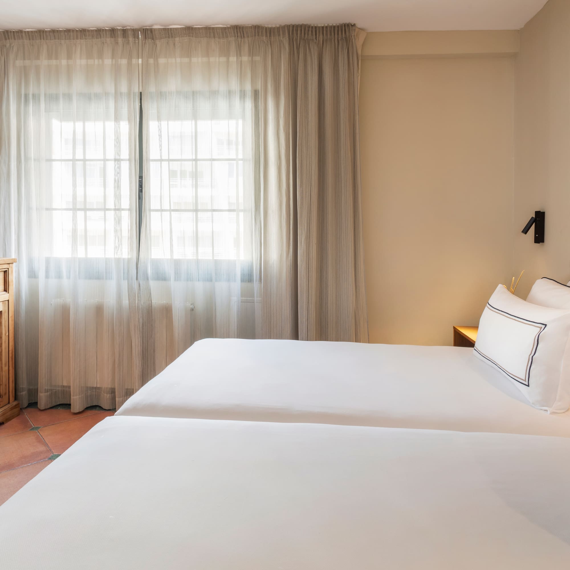 a two beds in a room