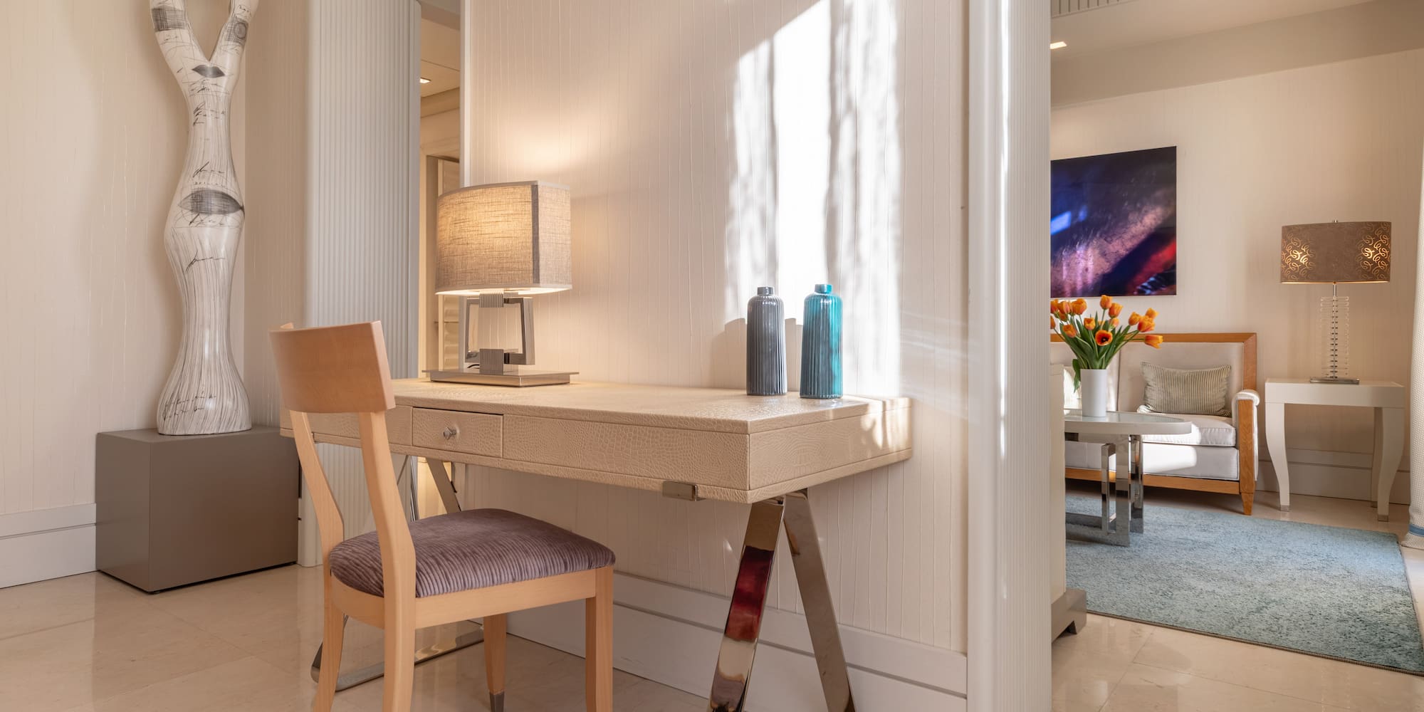 a desk and chair in a room