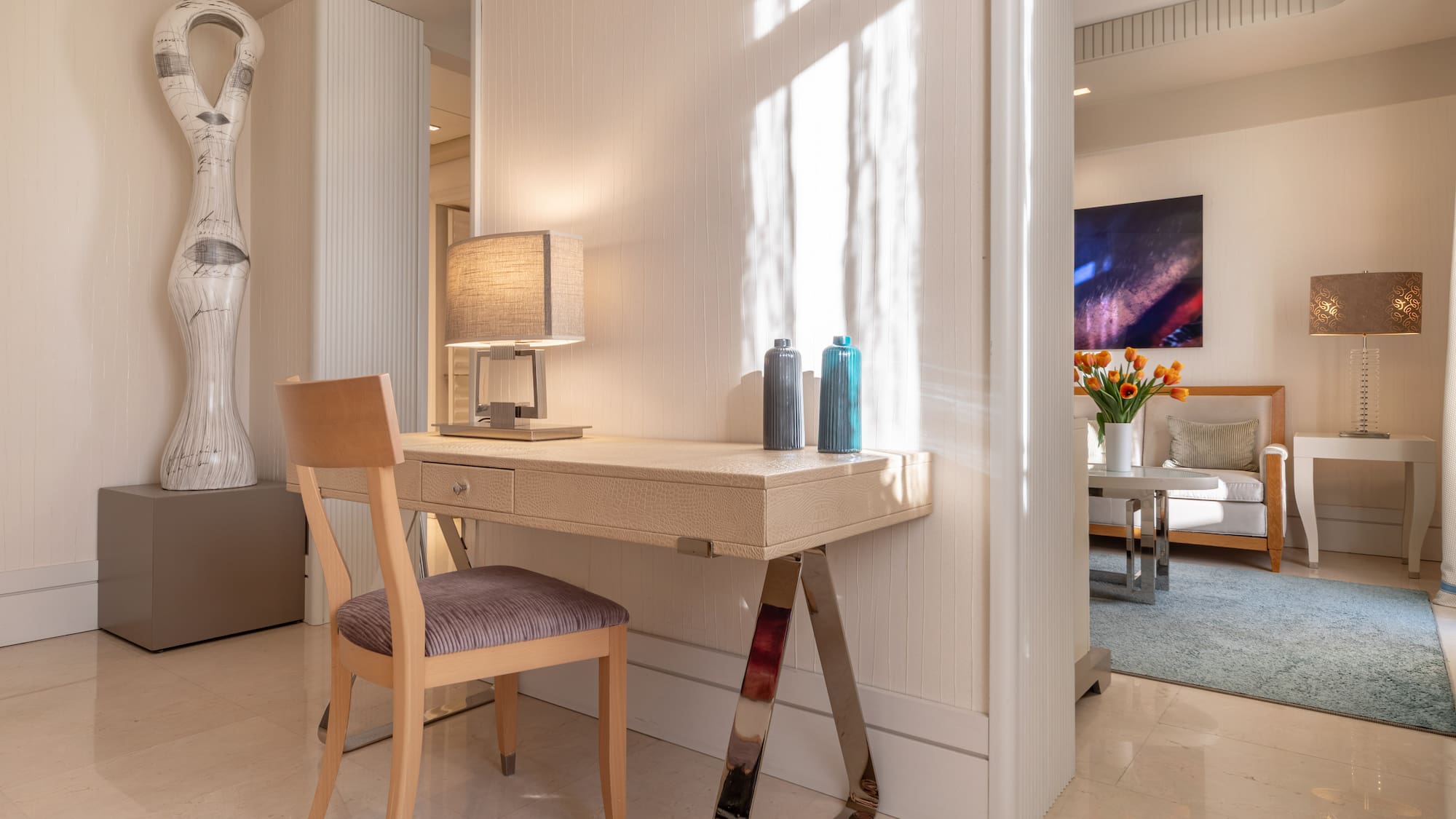 a desk and chair in a room