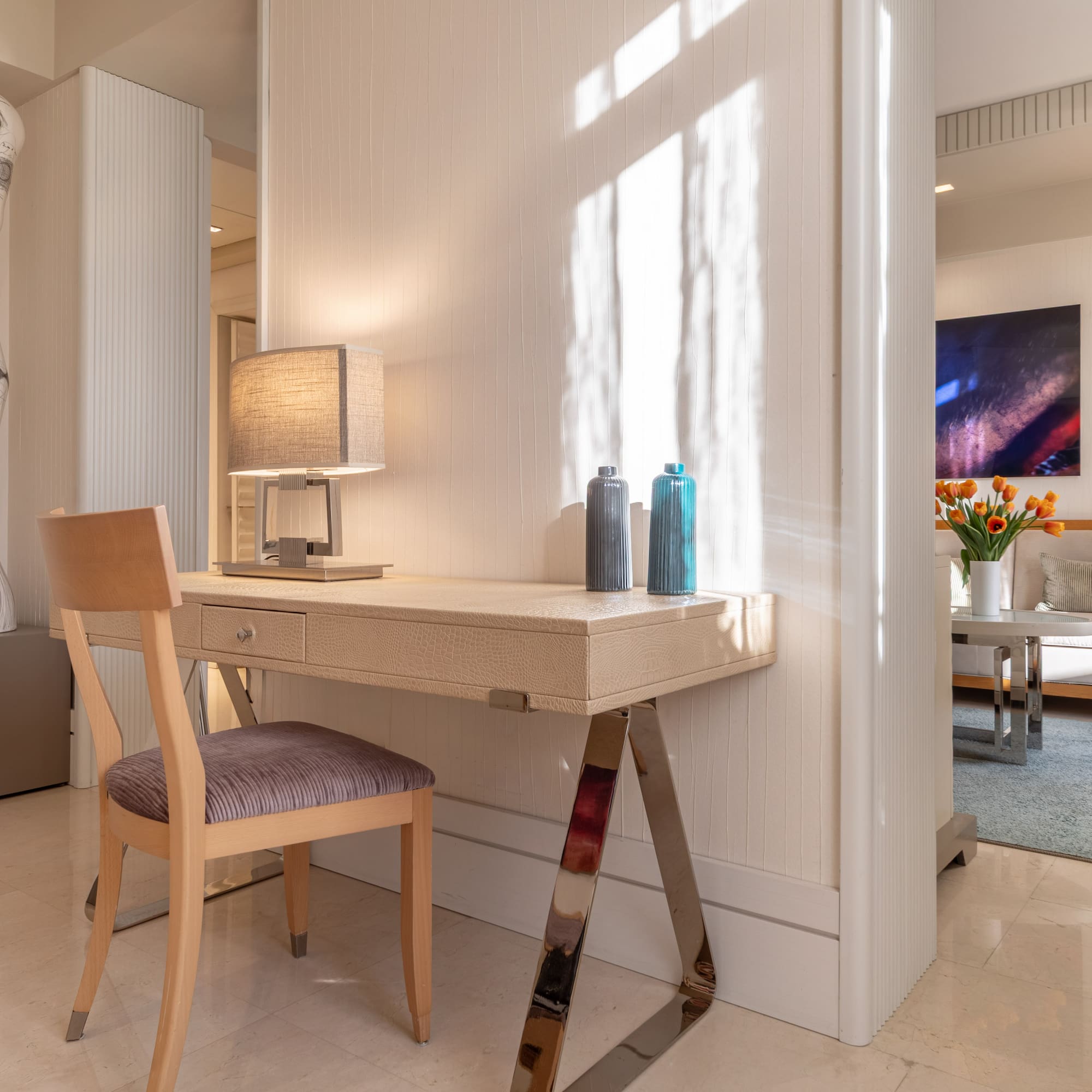 a desk and chair in a room