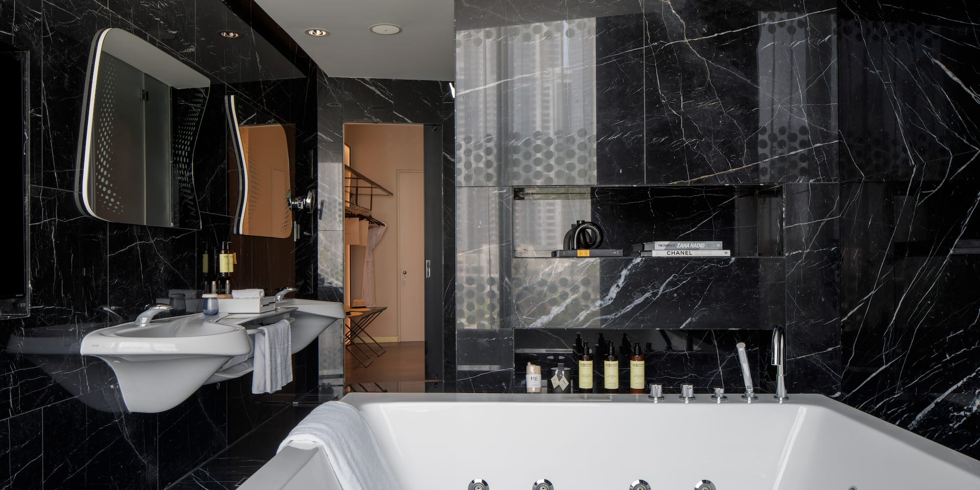 a bathroom with a bathtub and sink