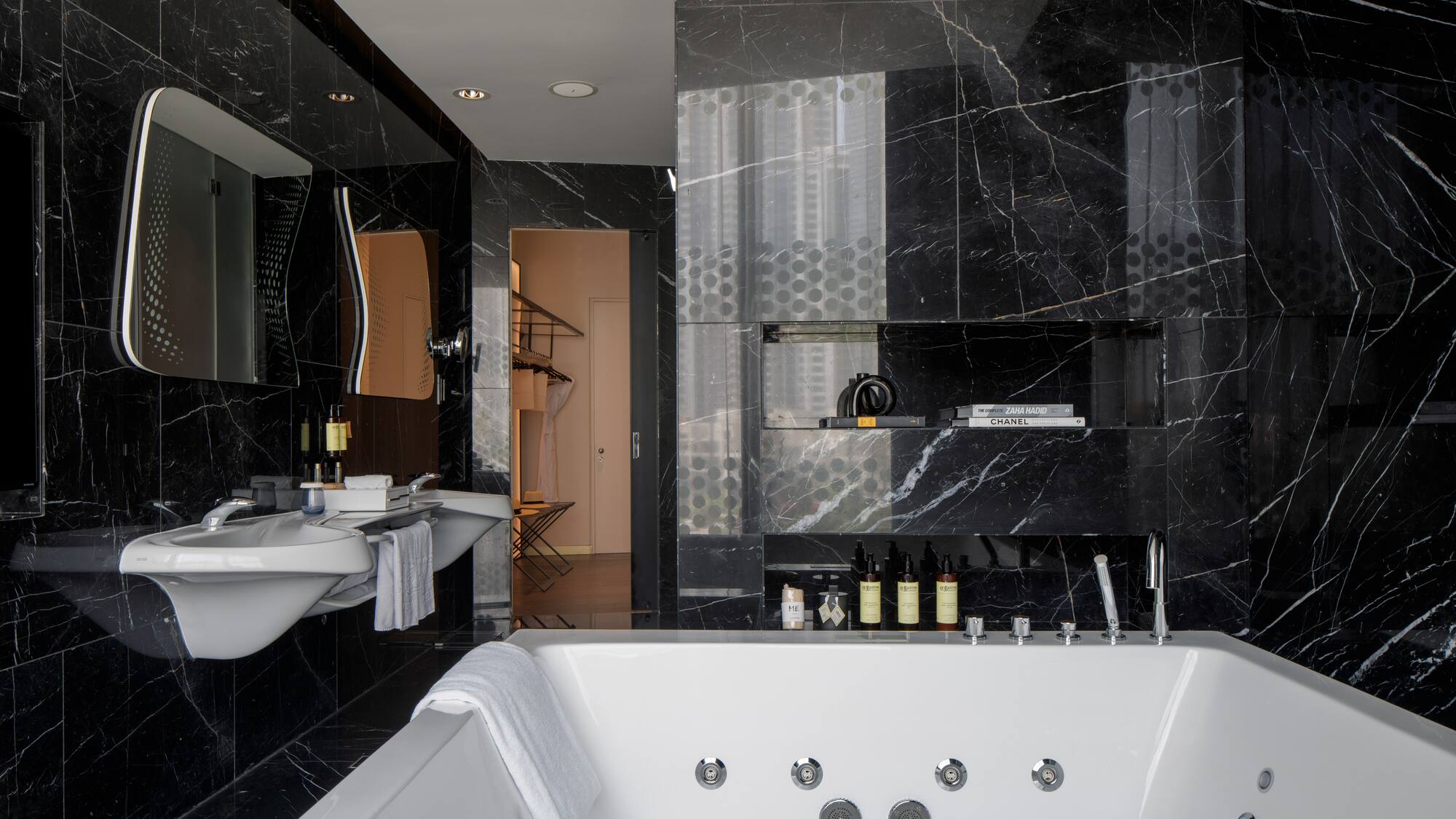 a bathroom with a bathtub and sink