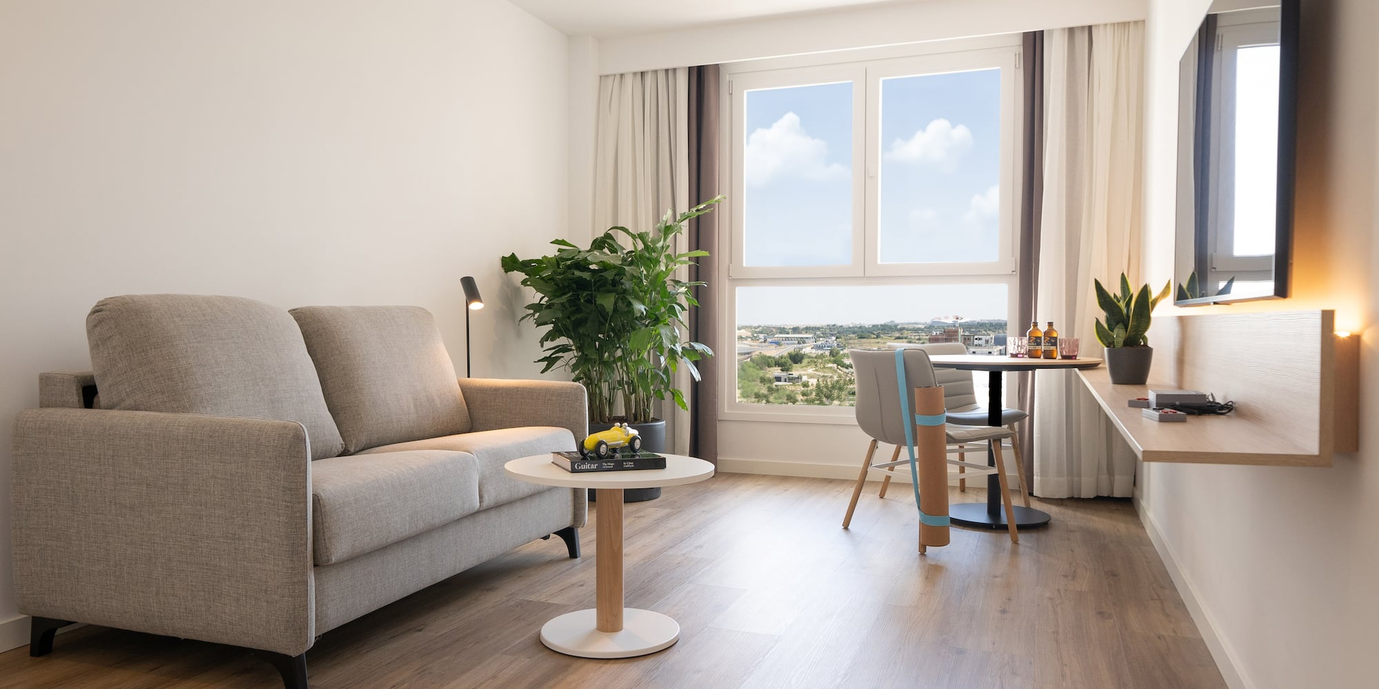 a living room with a couch and a table