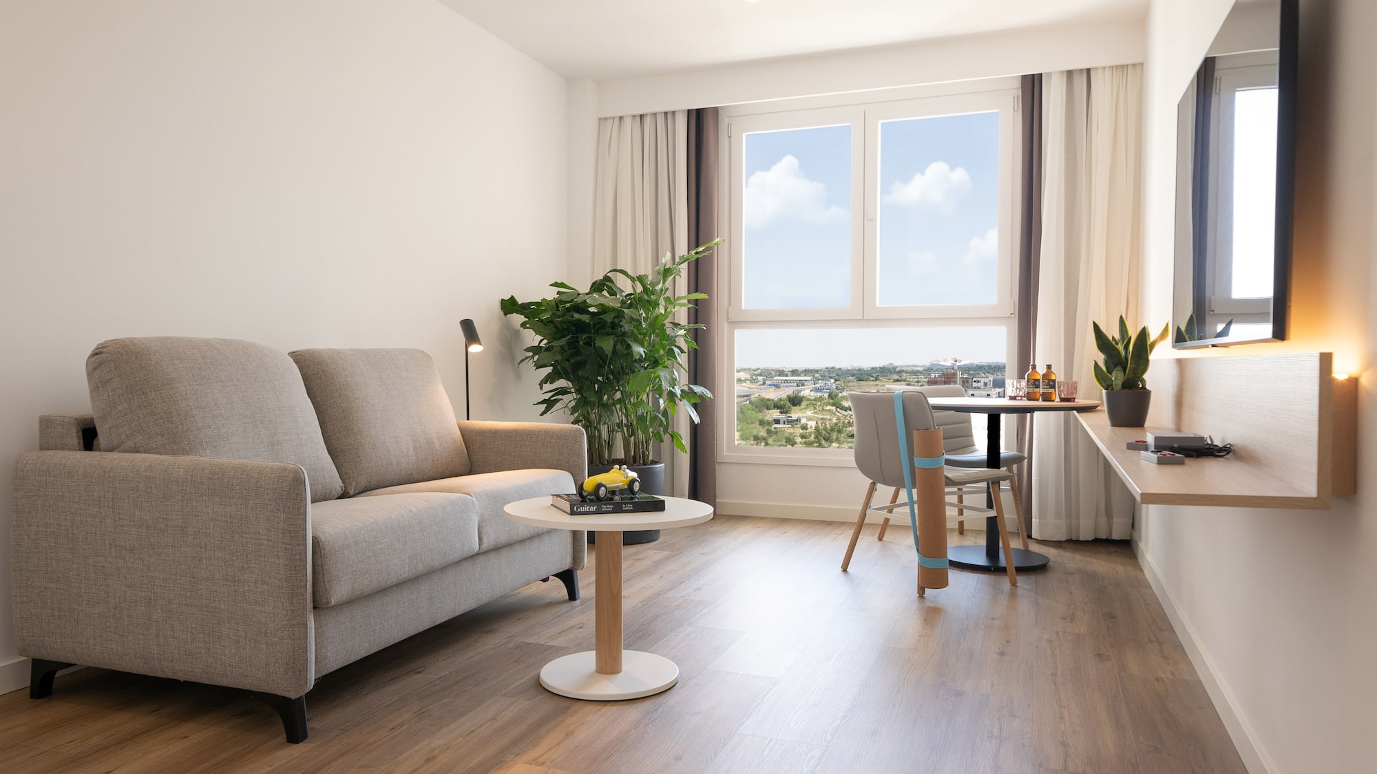 a living room with a couch and a table