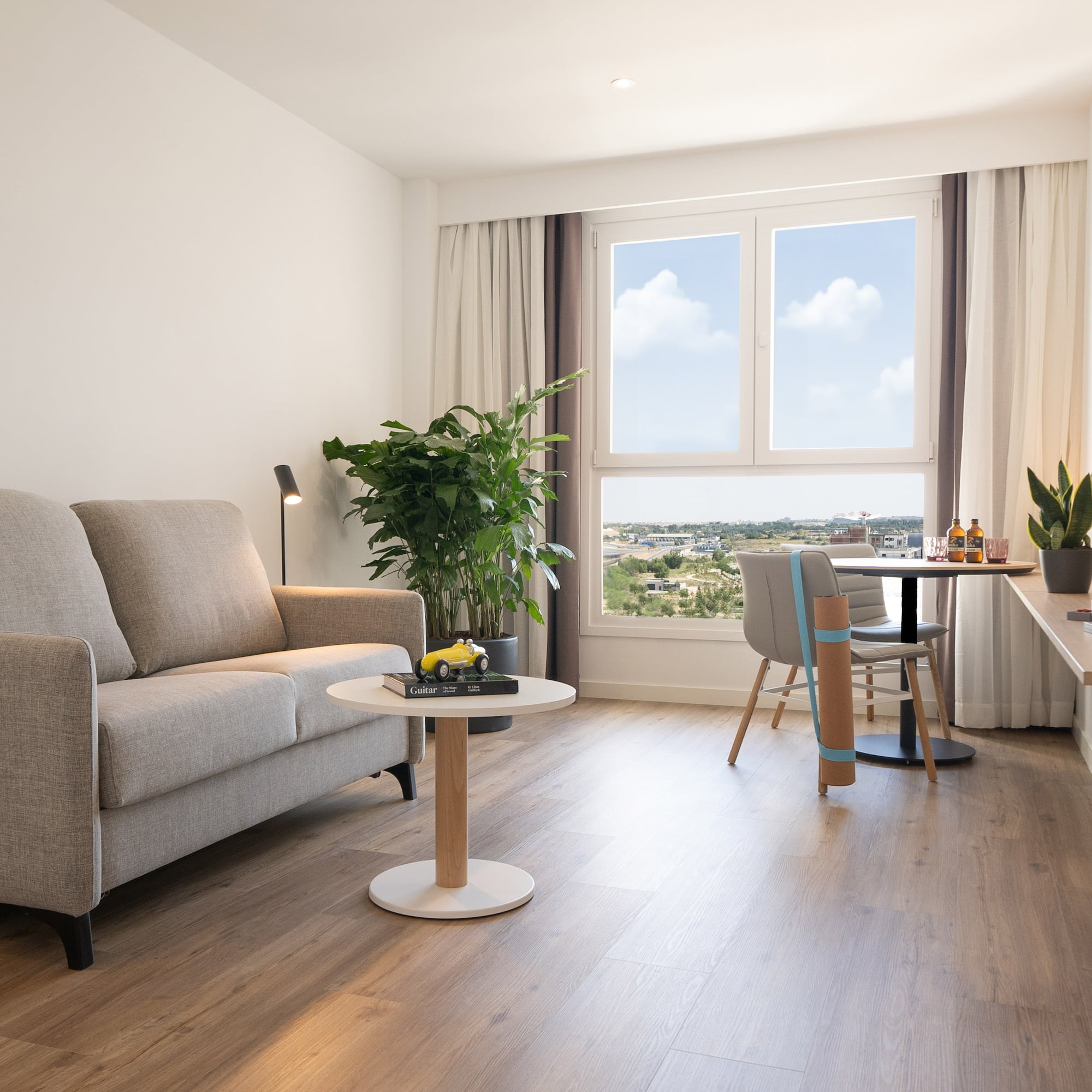 a living room with a couch and a table