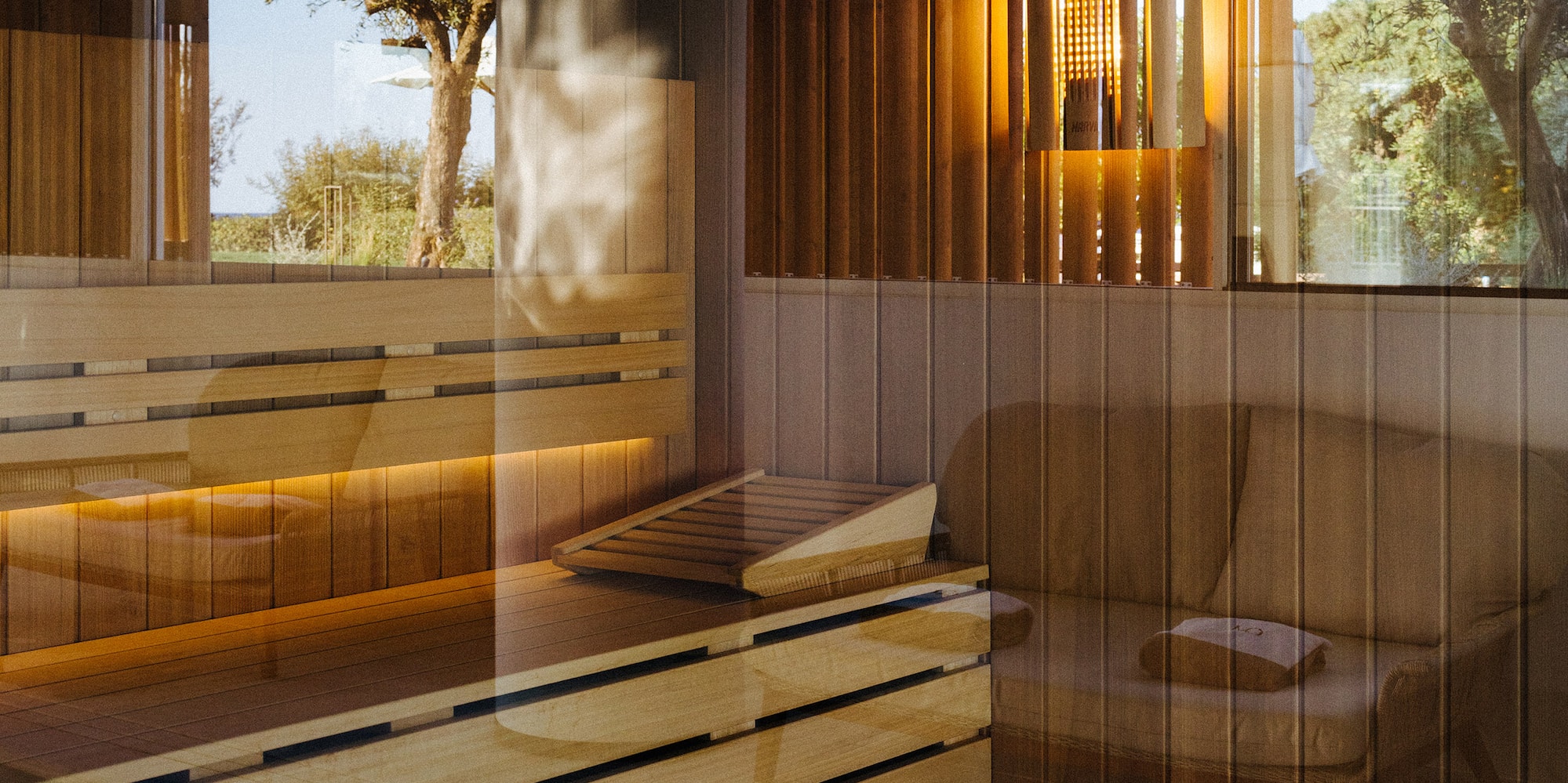 a room with a bench and a window