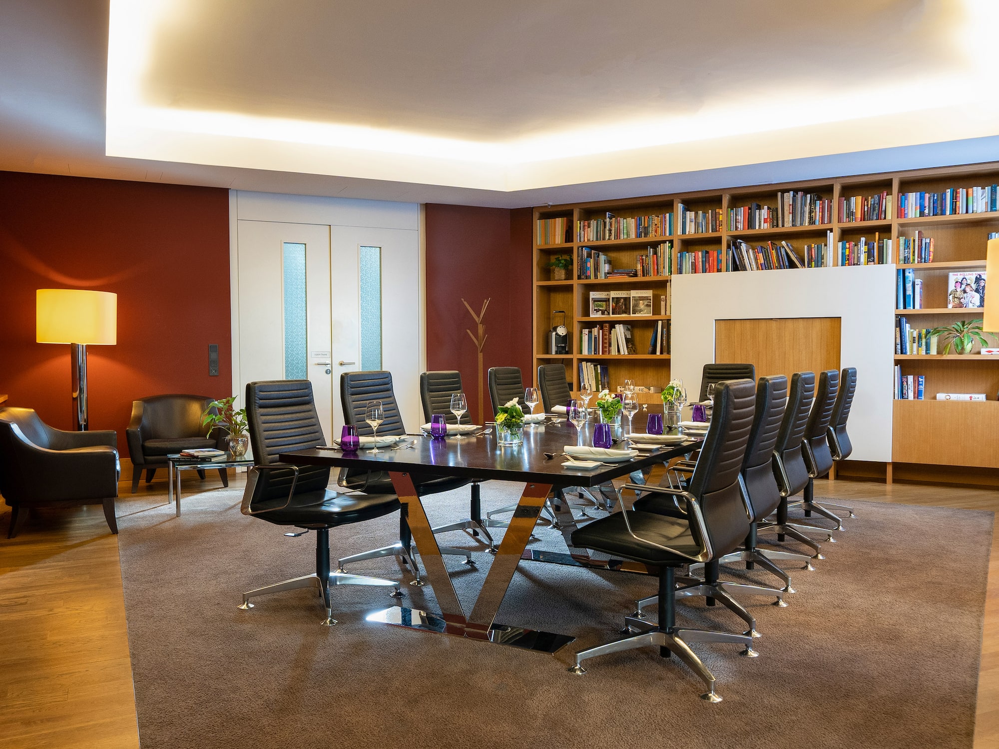 a conference room with a table and chairs