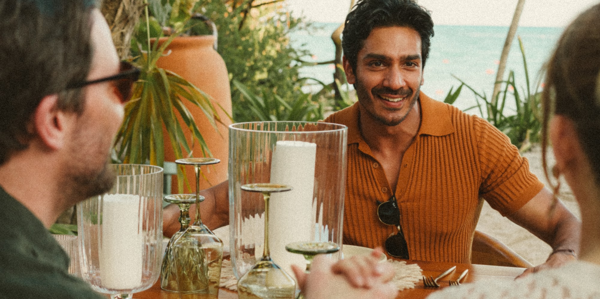 a group of people sitting at a table