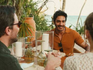 a group of people sitting at a table