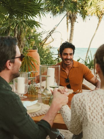 a group of people sitting at a table