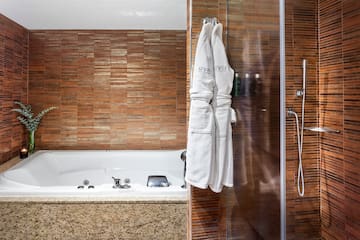 a bathtub and bathtub in a bathroom