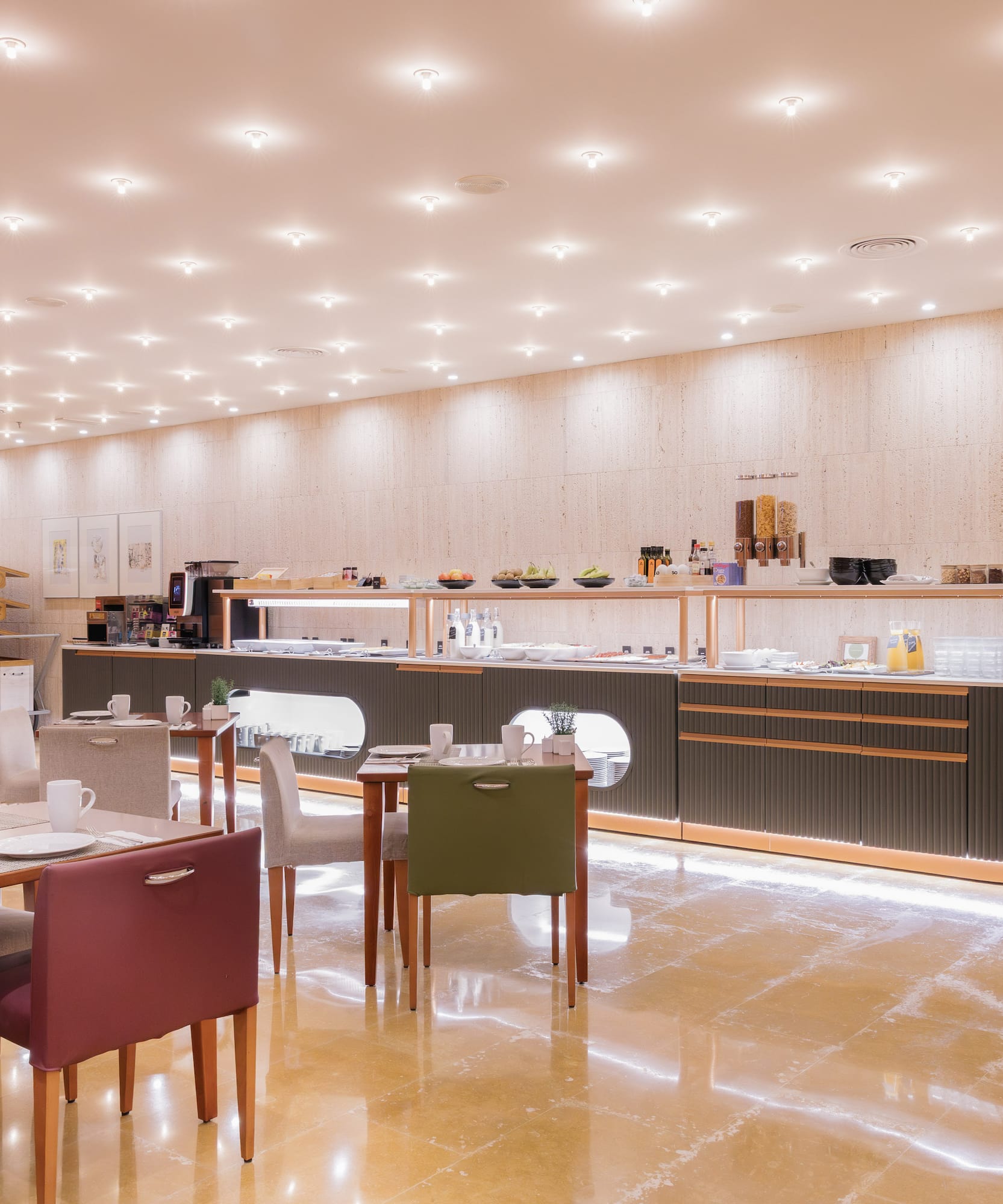 a room with a counter and tables