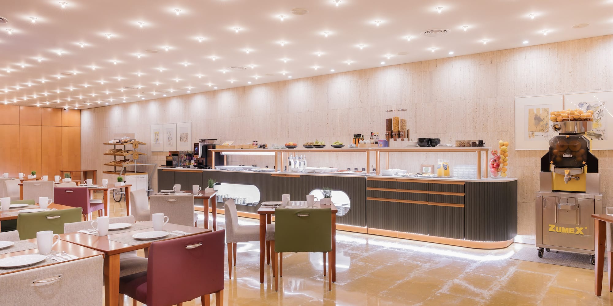 a room with a counter and tables