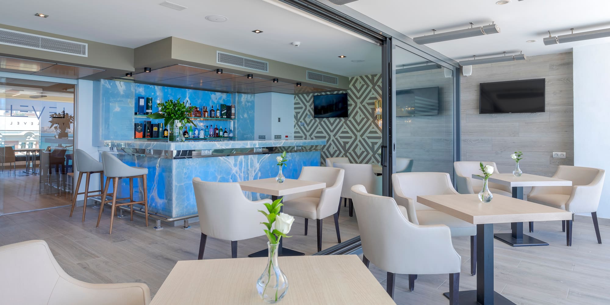 a room with tables and chairs