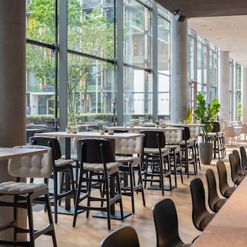 a room with tables and chairs