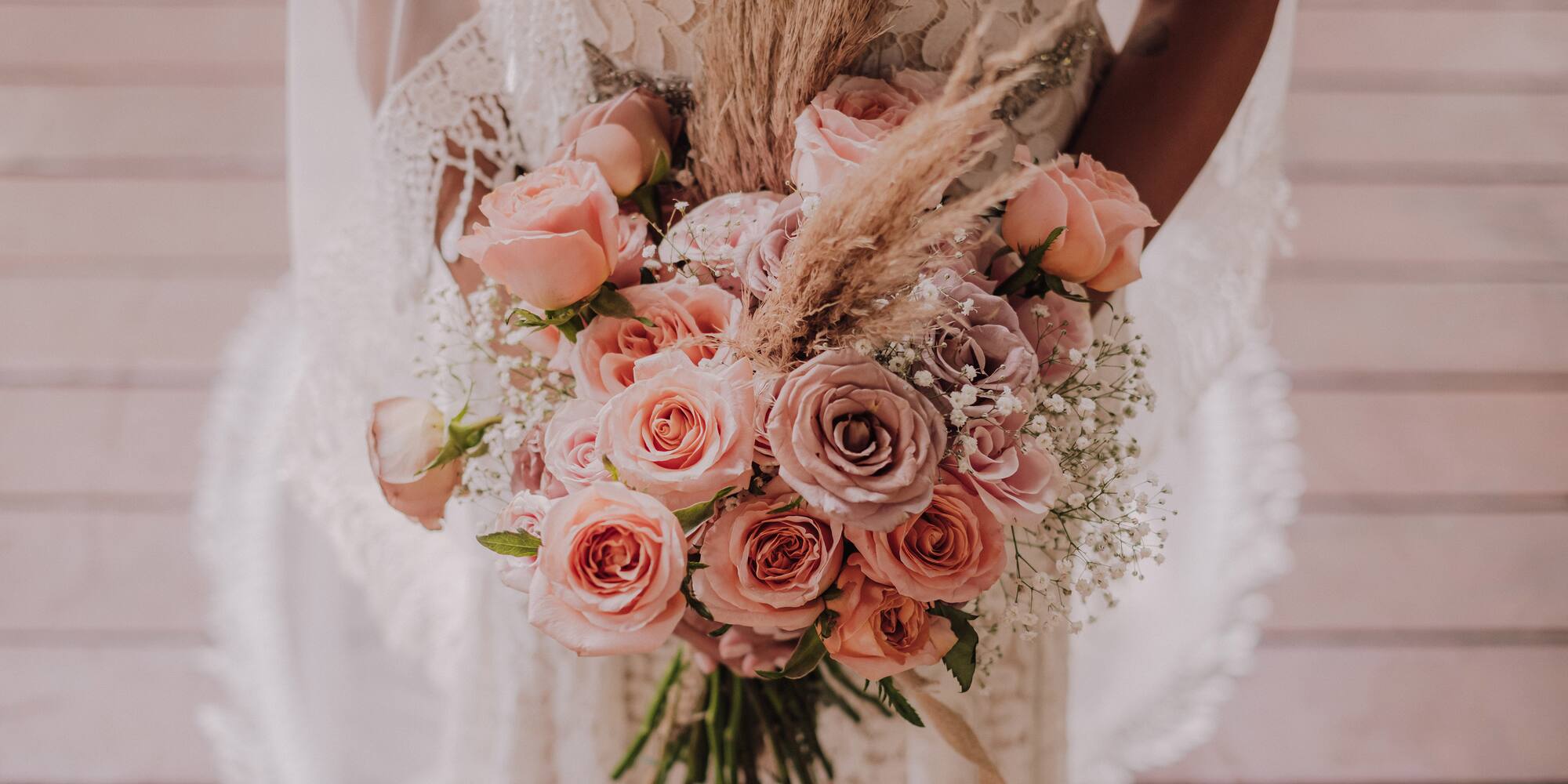a person holding a bouquet of flowers