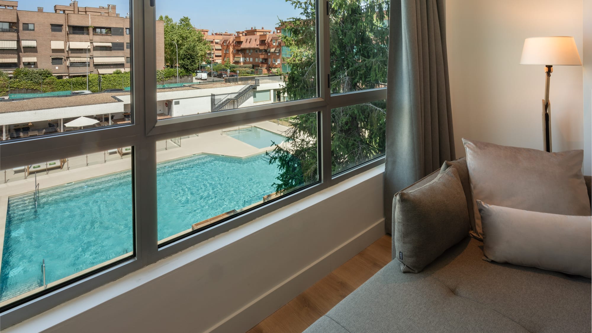 a couch next to a window