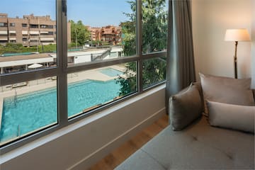 a couch next to a window