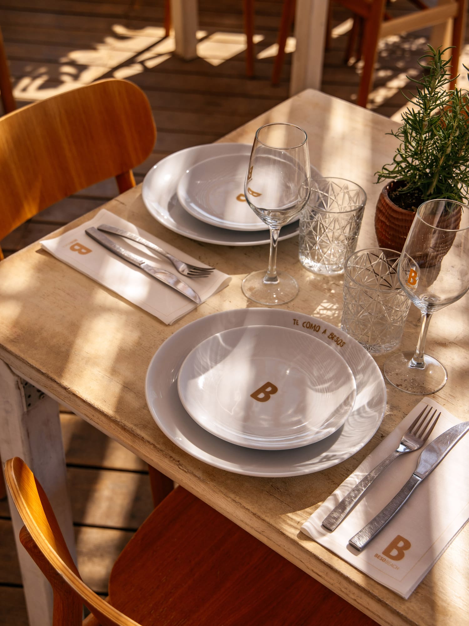 a table with plates and glasses