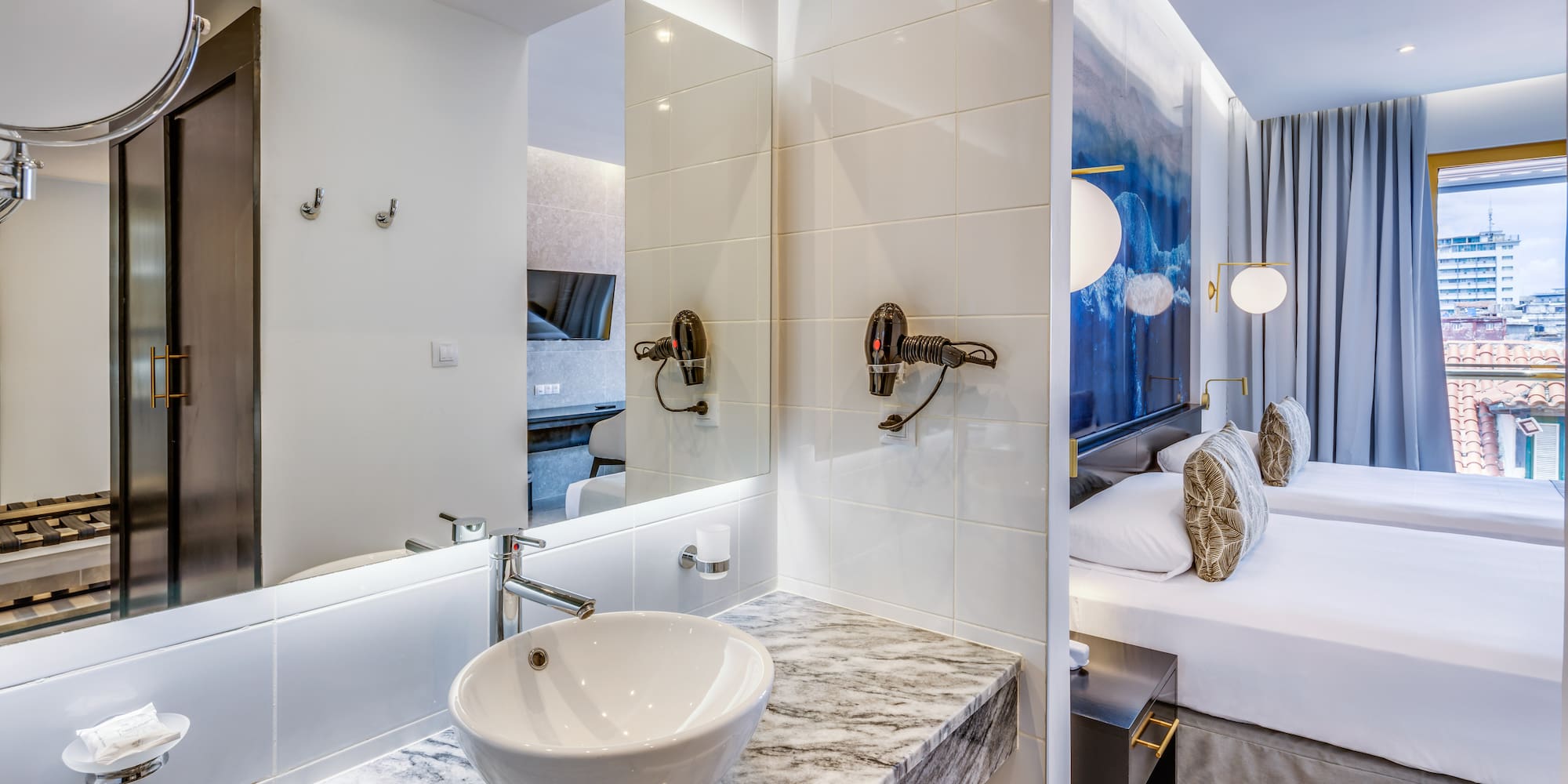 a bathroom with a sink and mirror