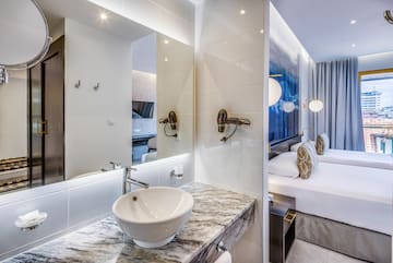 a bathroom with a sink and mirror