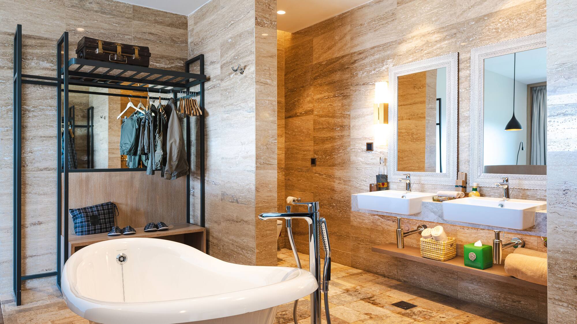 a bathroom with a tub and sink