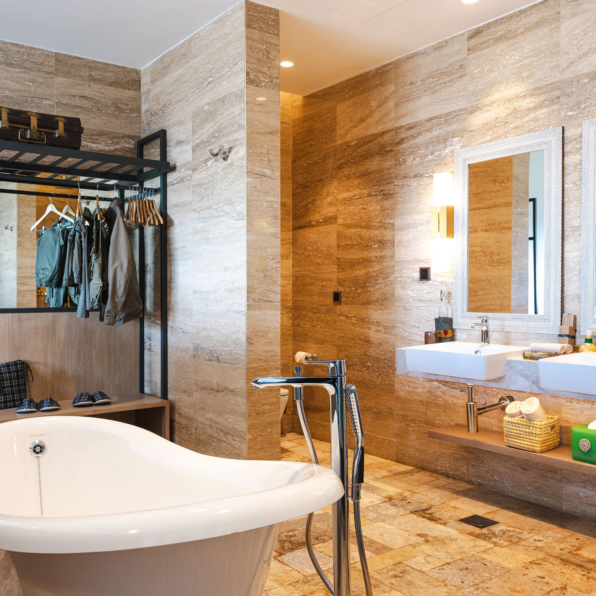 a bathroom with a tub and sink
