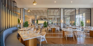 a room with tables and chairs