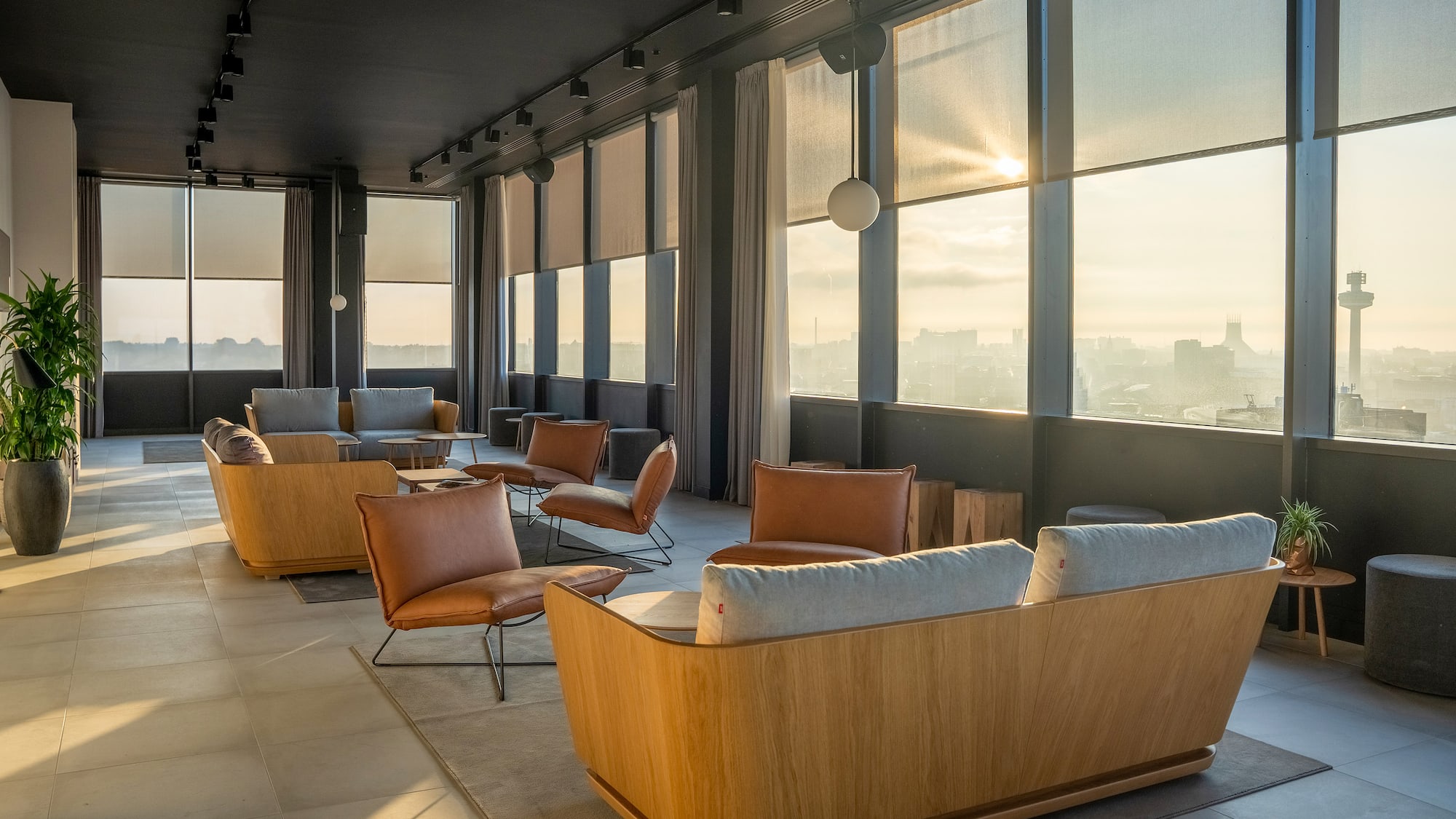 a room with couches and chairs