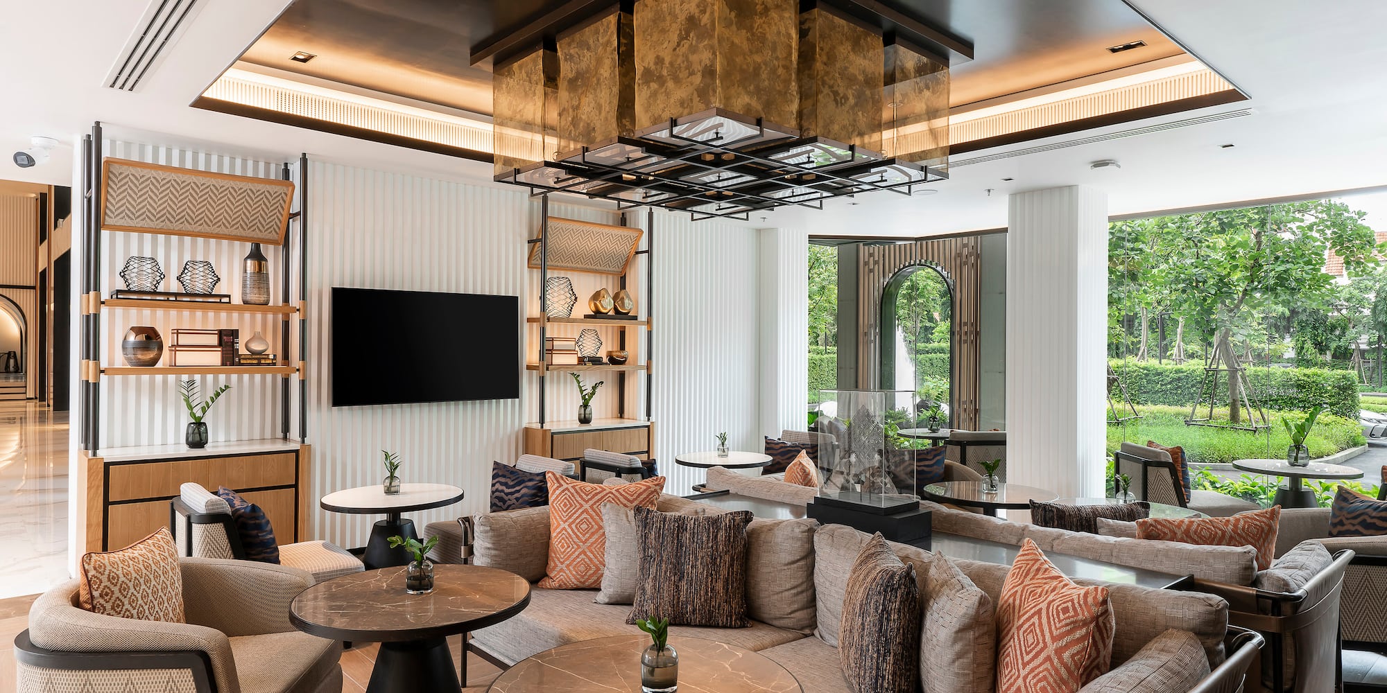 a room with a couch and tables