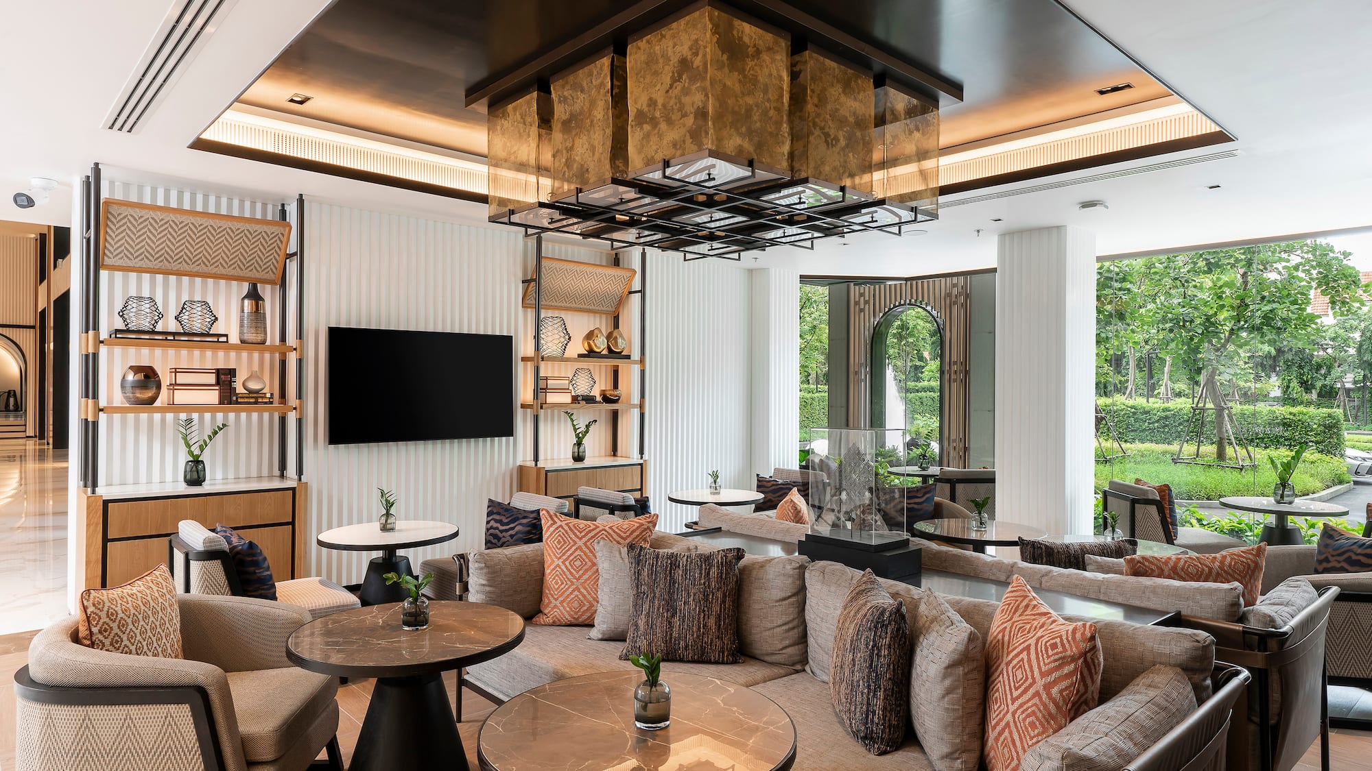 a room with a couch and tables