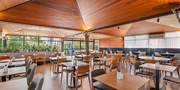 a room with tables and chairs