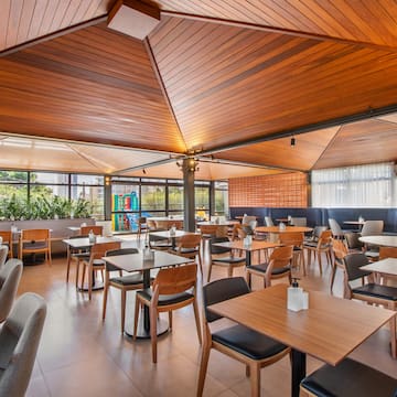 a room with tables and chairs