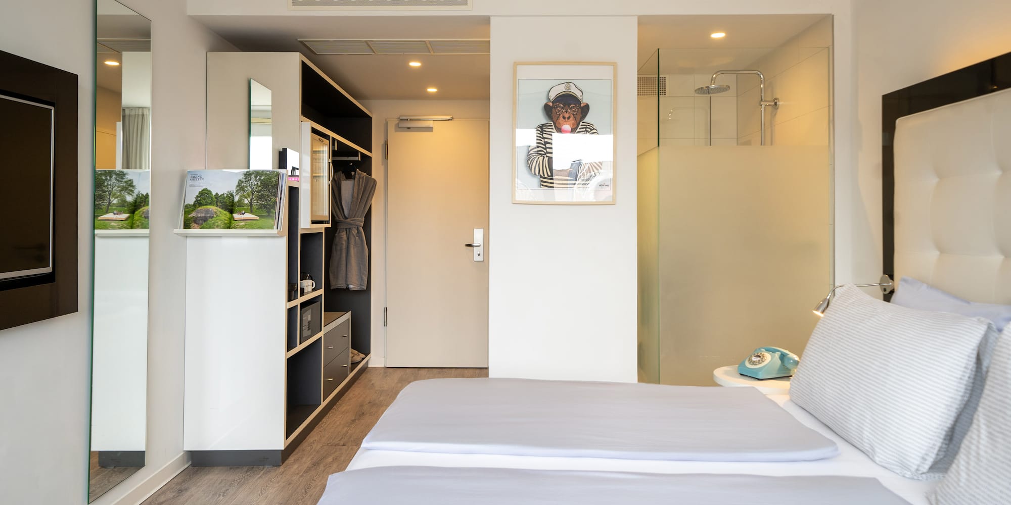 a room with a bed and a shower