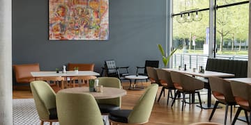 a room with tables and chairs