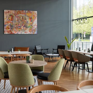 a room with tables and chairs