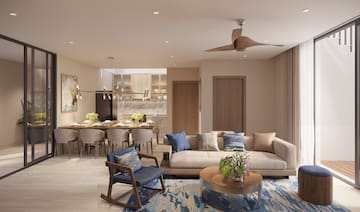 a living room with a couch and a dining table