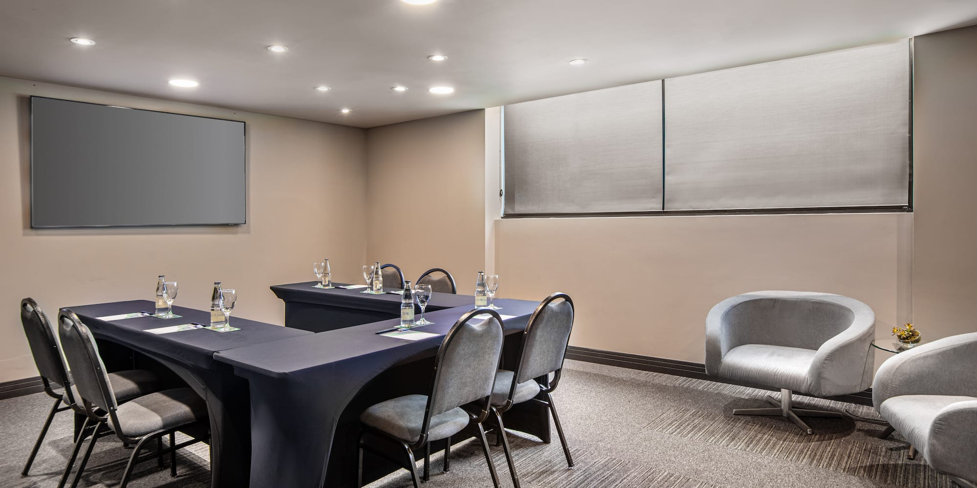 a room with a table and chairs