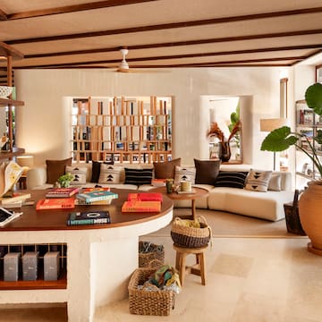 a living room with a couch and a table