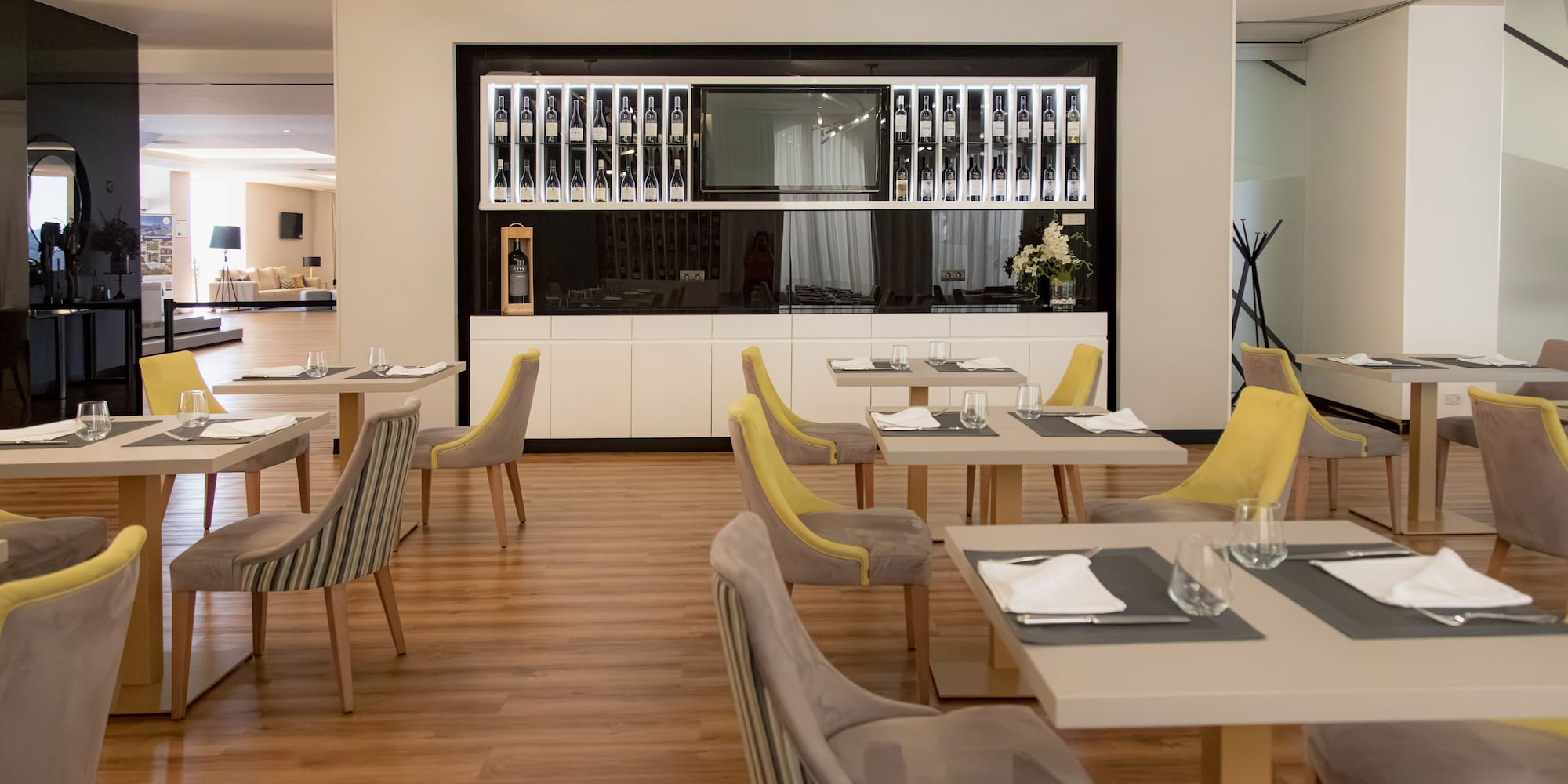 a room with tables and chairs