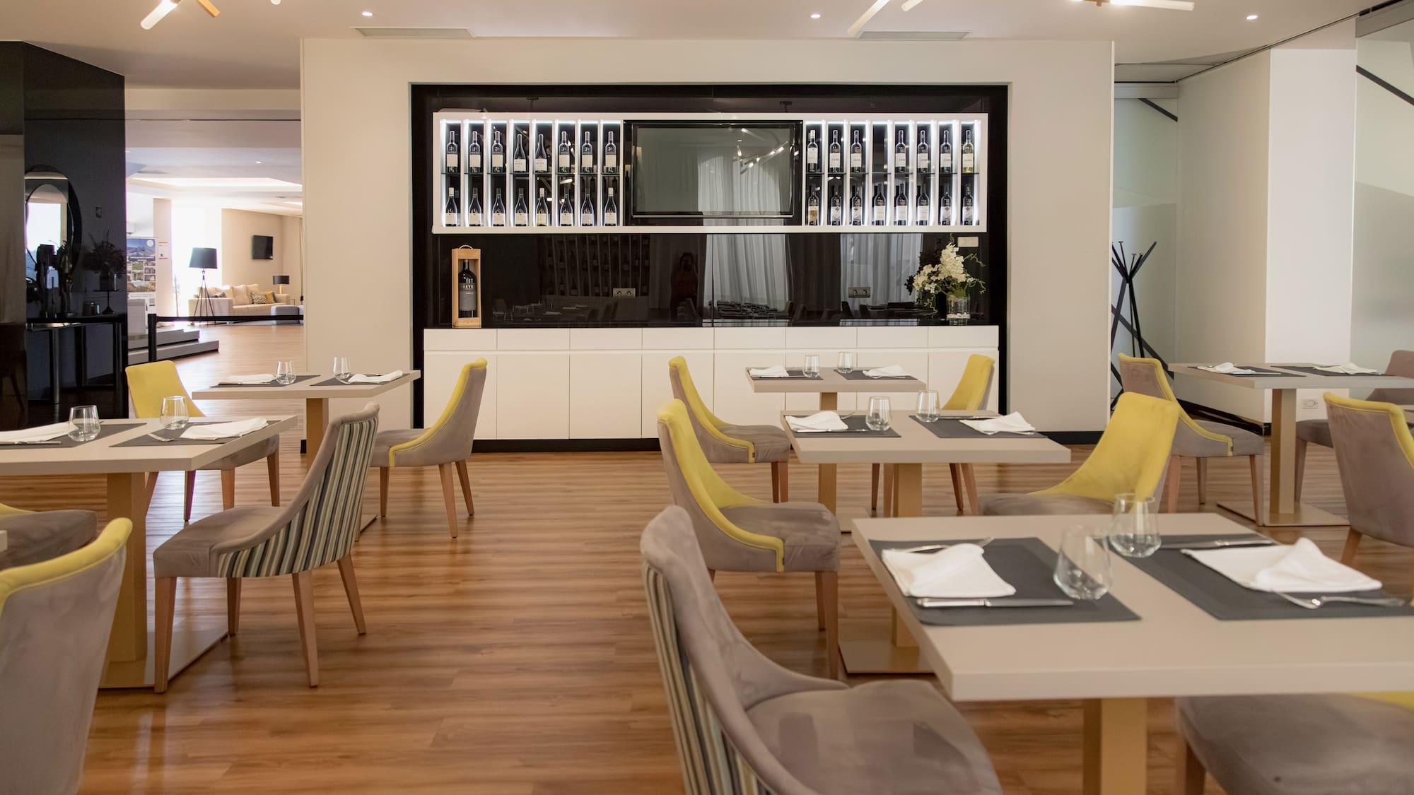 a room with tables and chairs