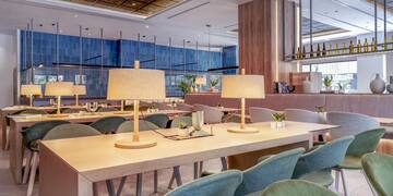 a room with tables and chairs