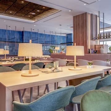 a room with tables and chairs