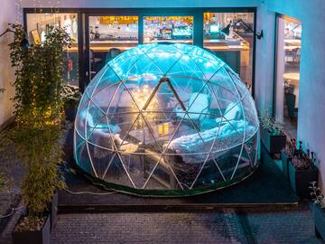 a glass dome with a blue light inside