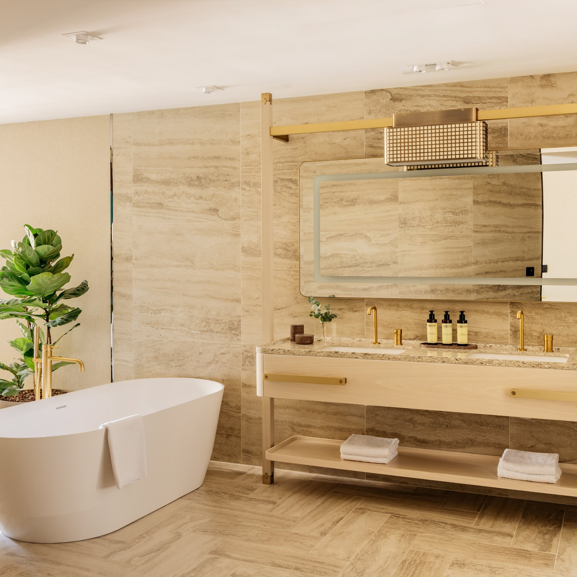 a bathroom with a tub and sink