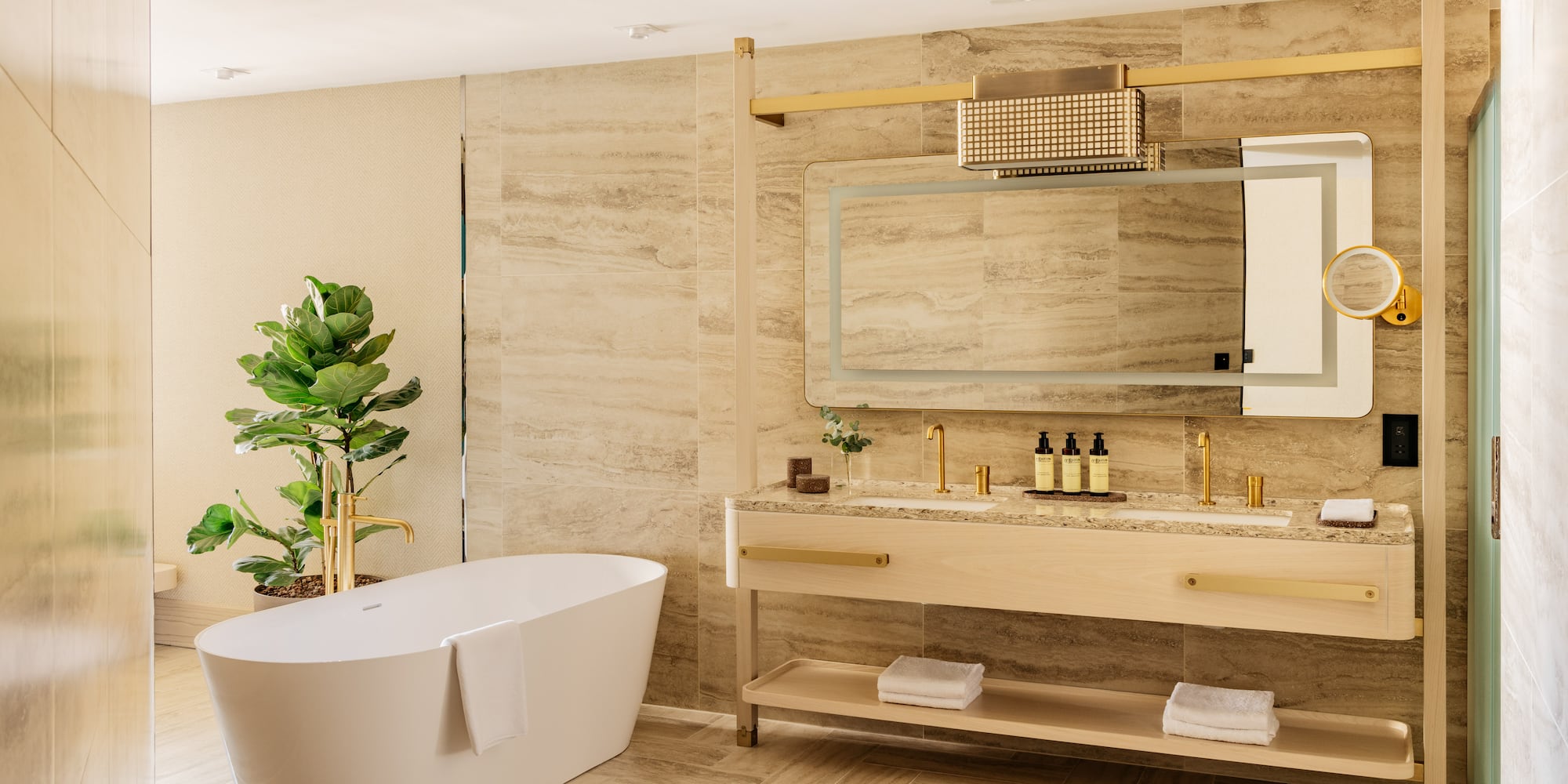 a bathroom with a tub and sink